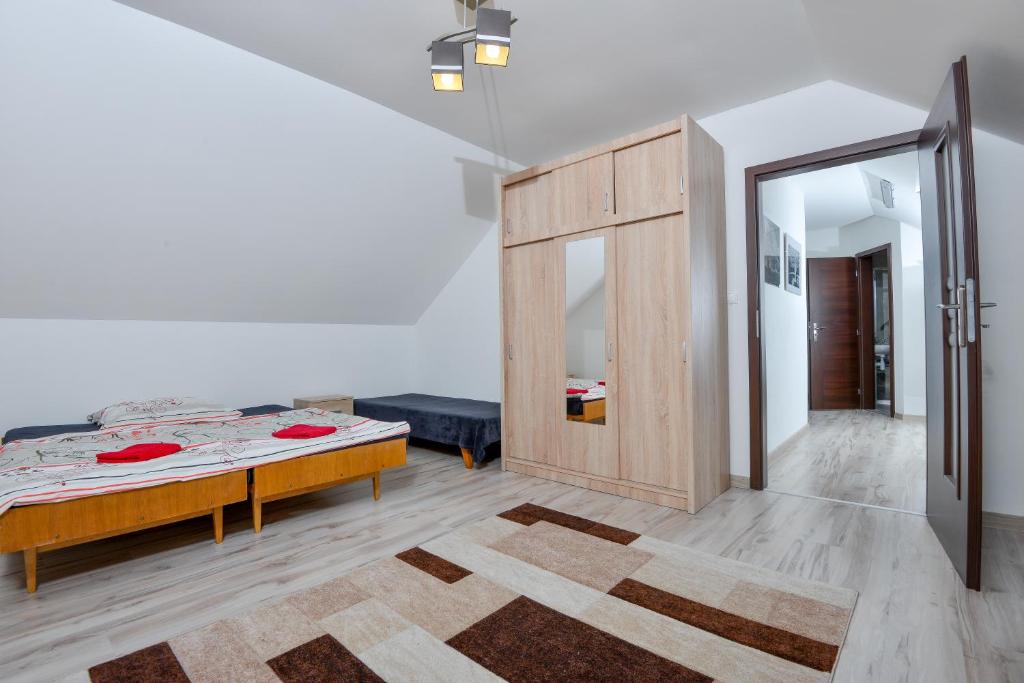 Postel nebo postele na pokoji v ubytování Apartments ADANA