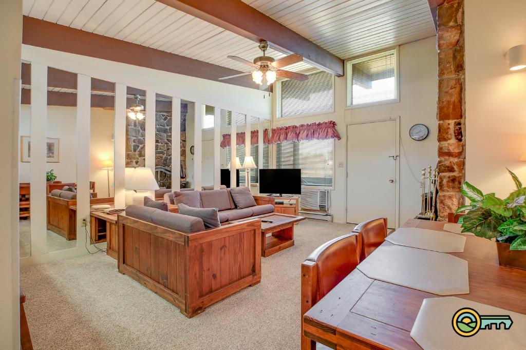 a living room with a couch and a table at Aspen East Unit #131 in Basye