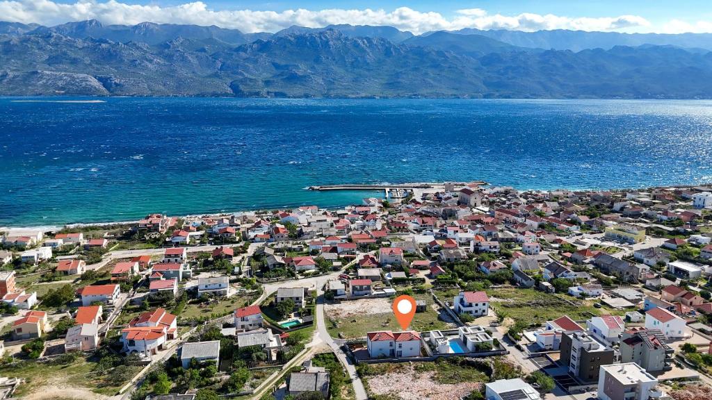 an aerial view of a town next to the water at Apartment Sankovic in Ražanac