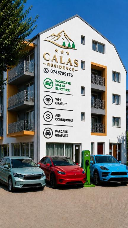 three cars parked in front of a building at Ap CALAS , No2 2A Parter, Free Parking in Râşnov