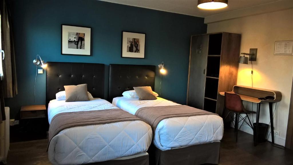 Postel nebo postele na pokoji v ubytování Hotel Des Cedres