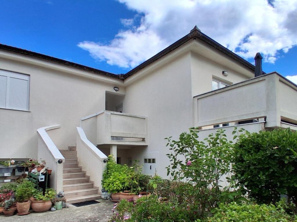 Apartments with parking space Rab - 27439