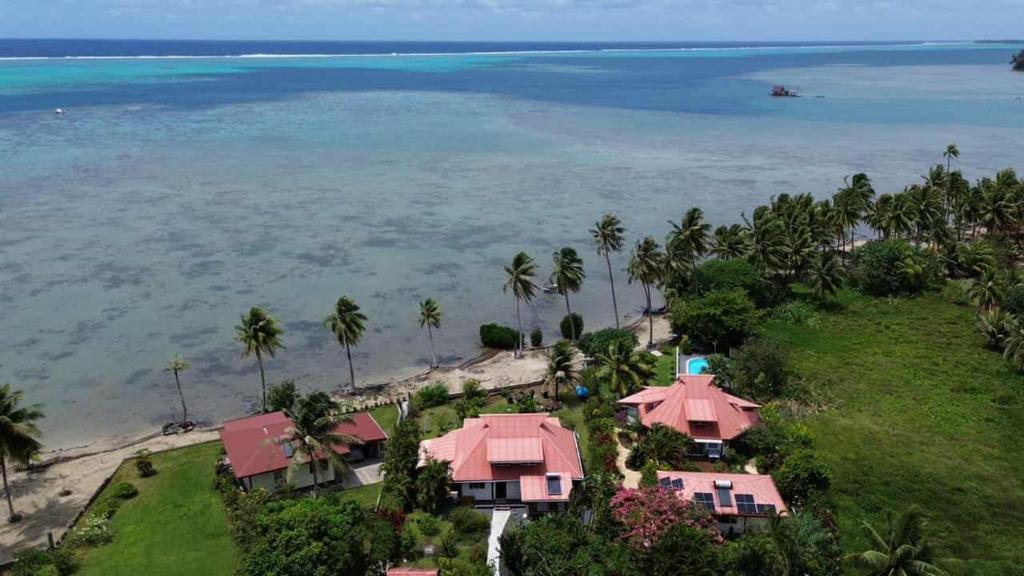 an aerial view of a resort and the ocean at Villa Fareatai in Ataiti
