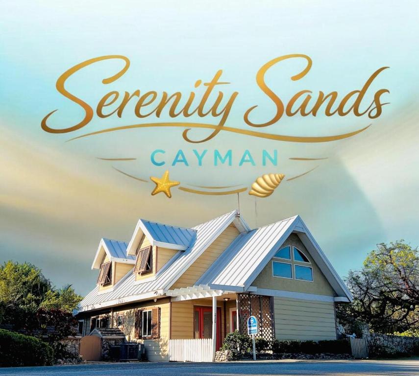 a picture of a house with the words security sands cayman at Serenity Sands Cayman in Bodden Town