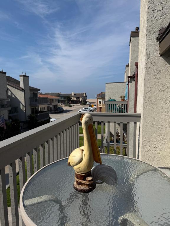 a banana toy sitting on a table on a balcony at Coastal Comfort in Oxnard