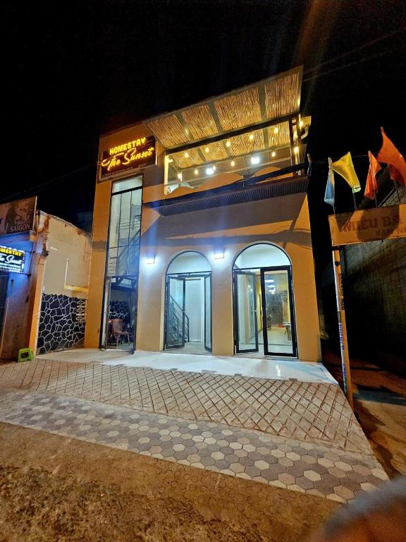 a store front of a building at night at Homestay The Sunset in Phan Thiet