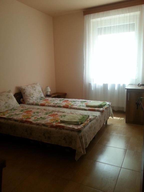 Postel nebo postele na pokoji v ubytování Marinica Apartman