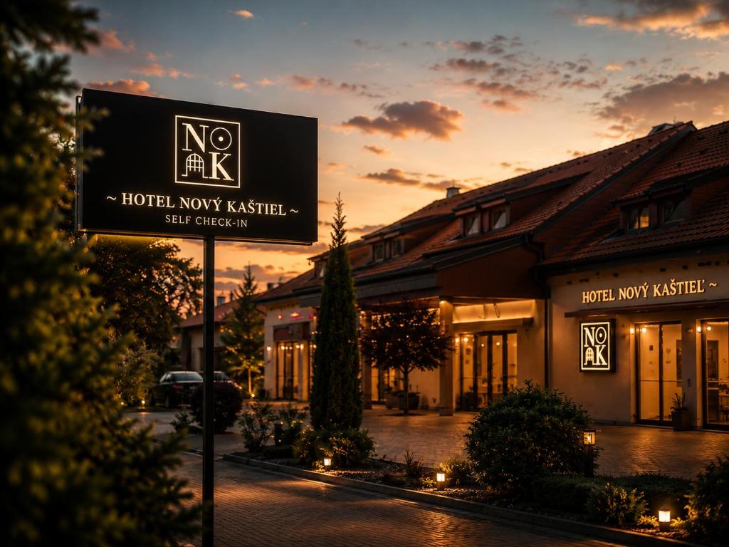 a no entry sign in front of a hotel newcastle at Hotel Novy Kastiel - Self check-in in Topoľčany