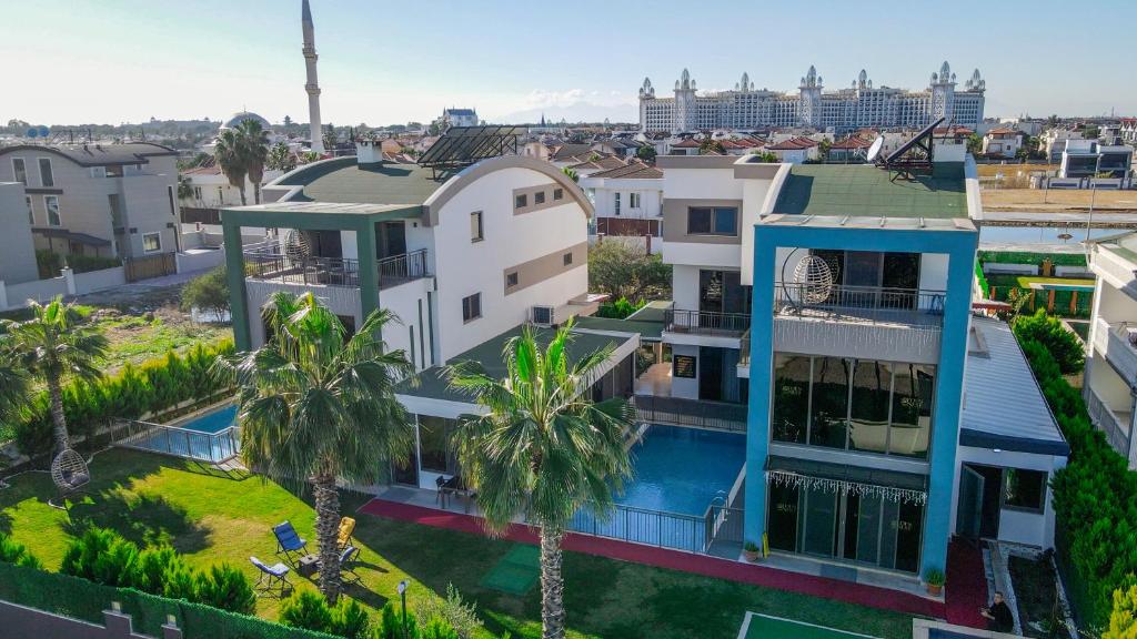 an aerial view of a house with palm trees at EDEN NEST EXCLUSIVE HOTEL in Belek