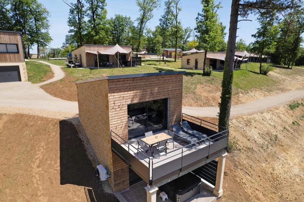 an overhead view of a house with a fireplace at Lodge Spa Celeste in Sarlat-la-Canéda
