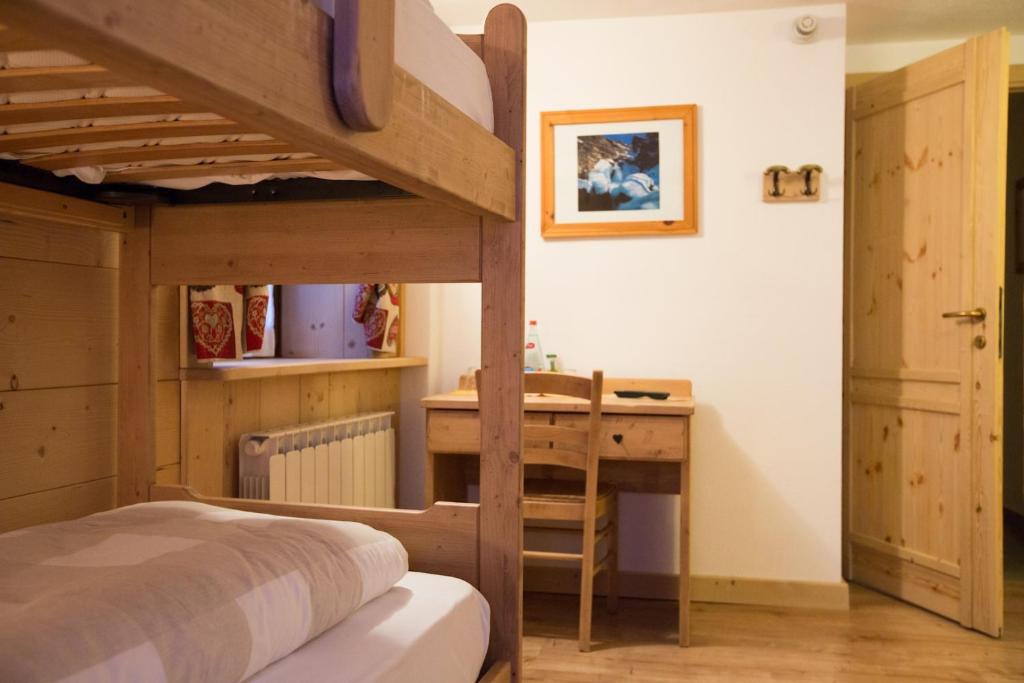 A bed or beds in a room at Hotel Restaurant La Barme