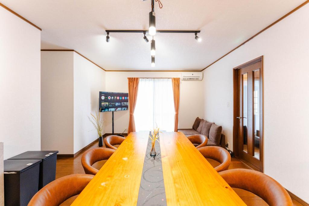 a conference room with a long table and chairs at Gunkanjima 307 in Nagasaki