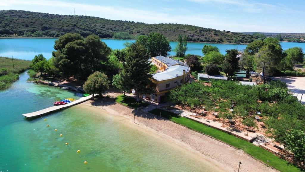 an aerial view of a resort on a beach at Hotel Entrelagos in Ruidera