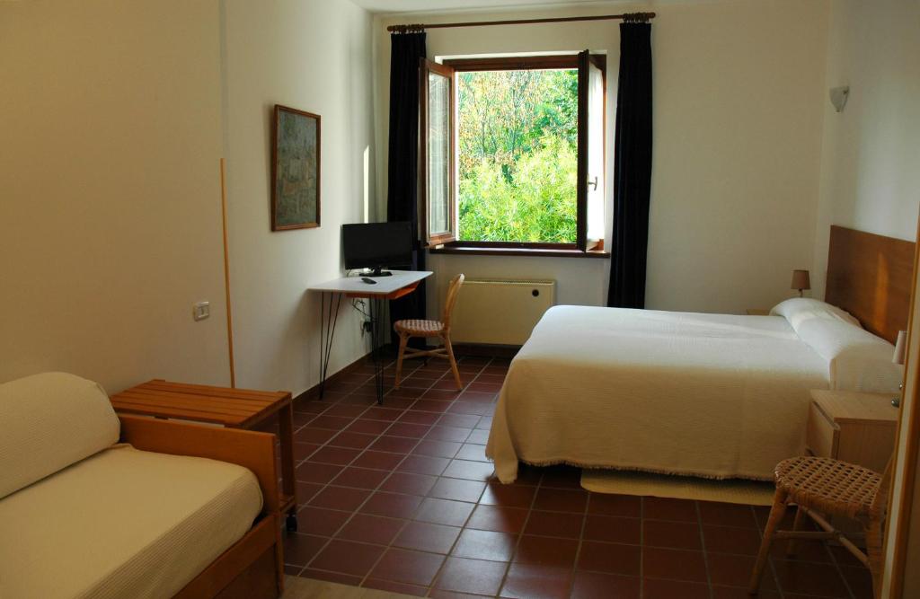 Postel nebo postele na pokoji v ubytování Hotel Sonenga