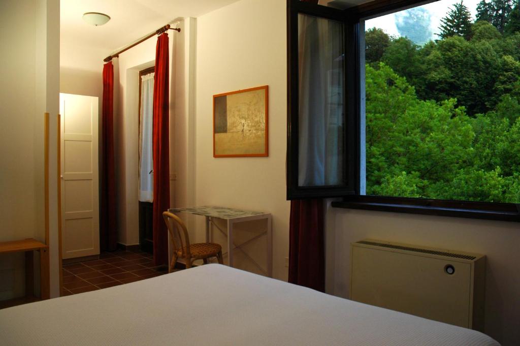 Postel nebo postele na pokoji v ubytování Hotel Sonenga