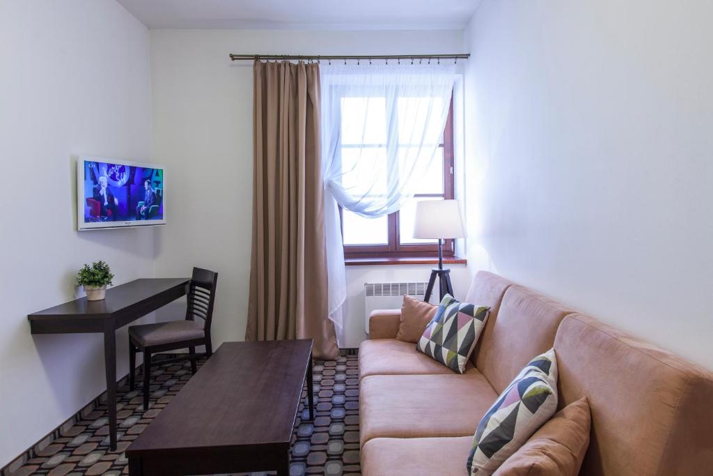 TV a/nebo společenská místnost v ubytování Hotel Salety