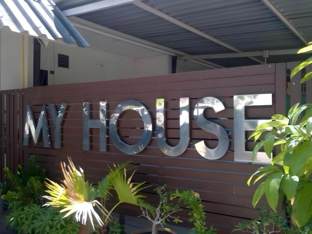 a sign that reads the sign for the main store at My House in Surin