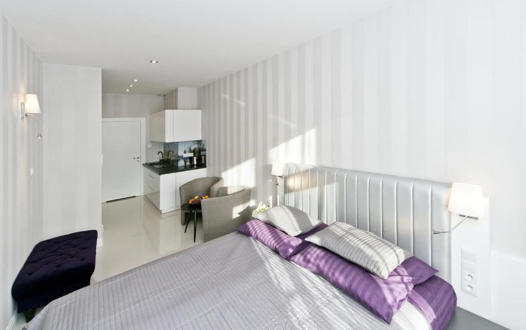 Posteľ alebo postele v izbe v ubytovaní Softly Residence