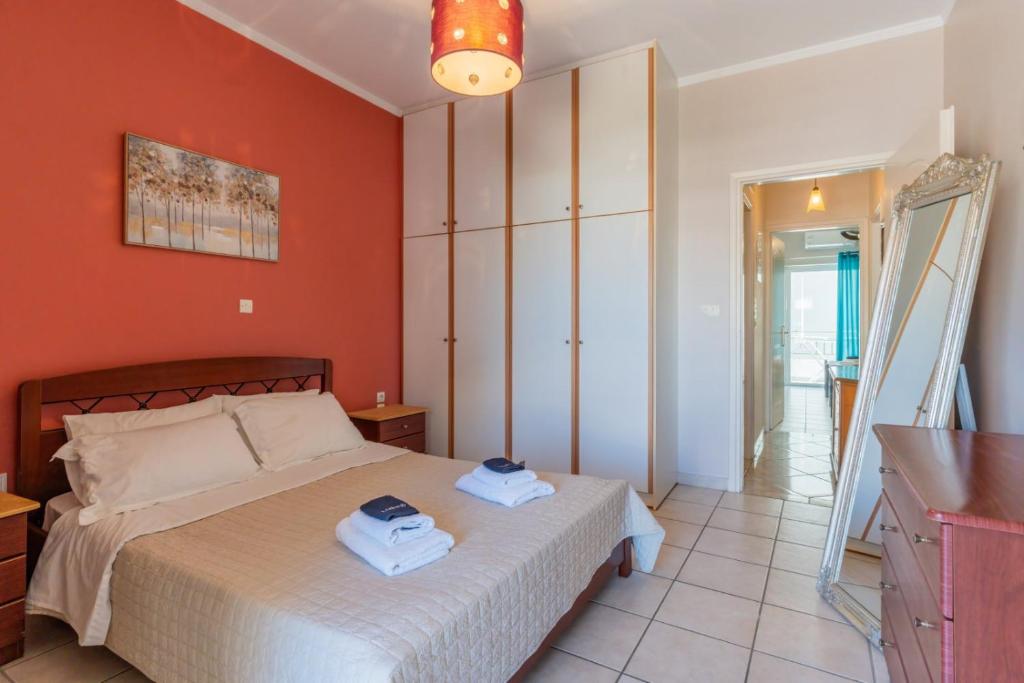 En eller flere senge i et værelse på VNM Apartment