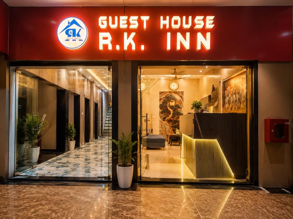a guest house rk inn sign in a building at Guest House RK inn in Gorakhpur