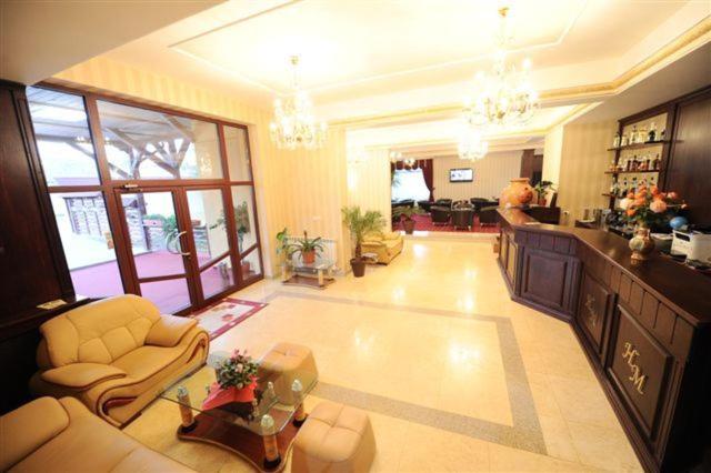 Posezení v ubytování Hotel Mondial - Baia