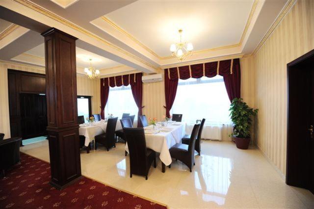 Posezení v ubytování Hotel Mondial - Baia