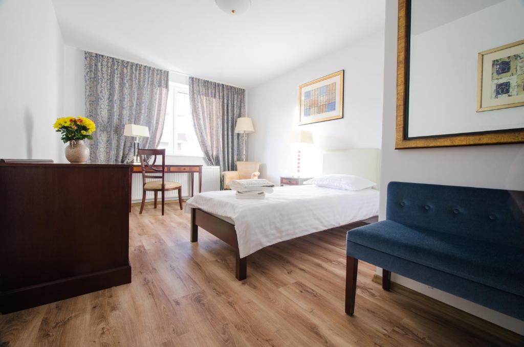 Postel nebo postele na pokoji v ubytování Hotel EKA