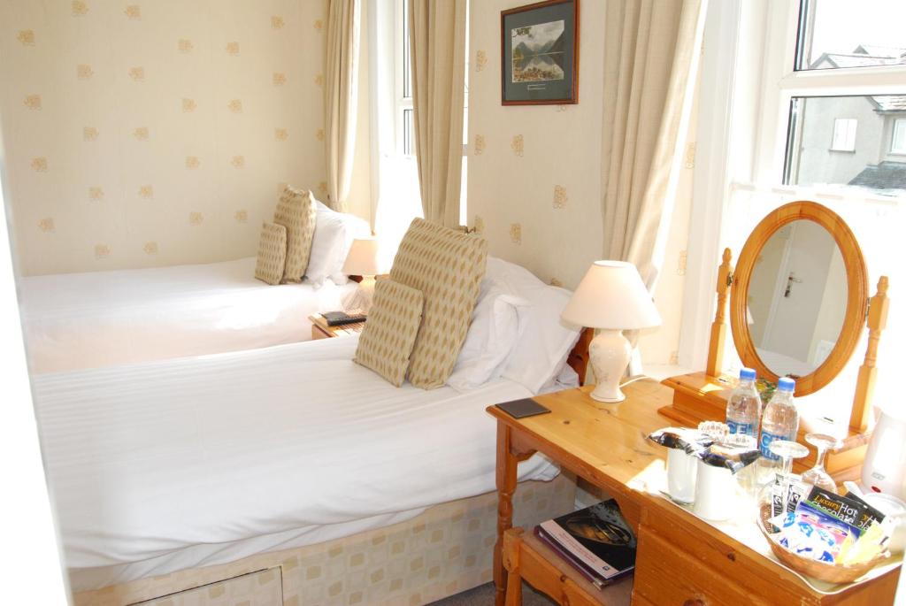 Letto o letti in una camera di Beckside Guest House Keswick