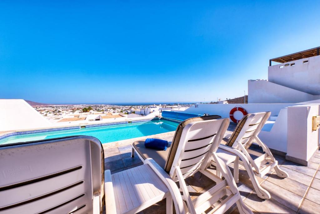 Villa - Lava and Sea - Pool, BBQ and Sea View By Lanzarote Vacation Homes