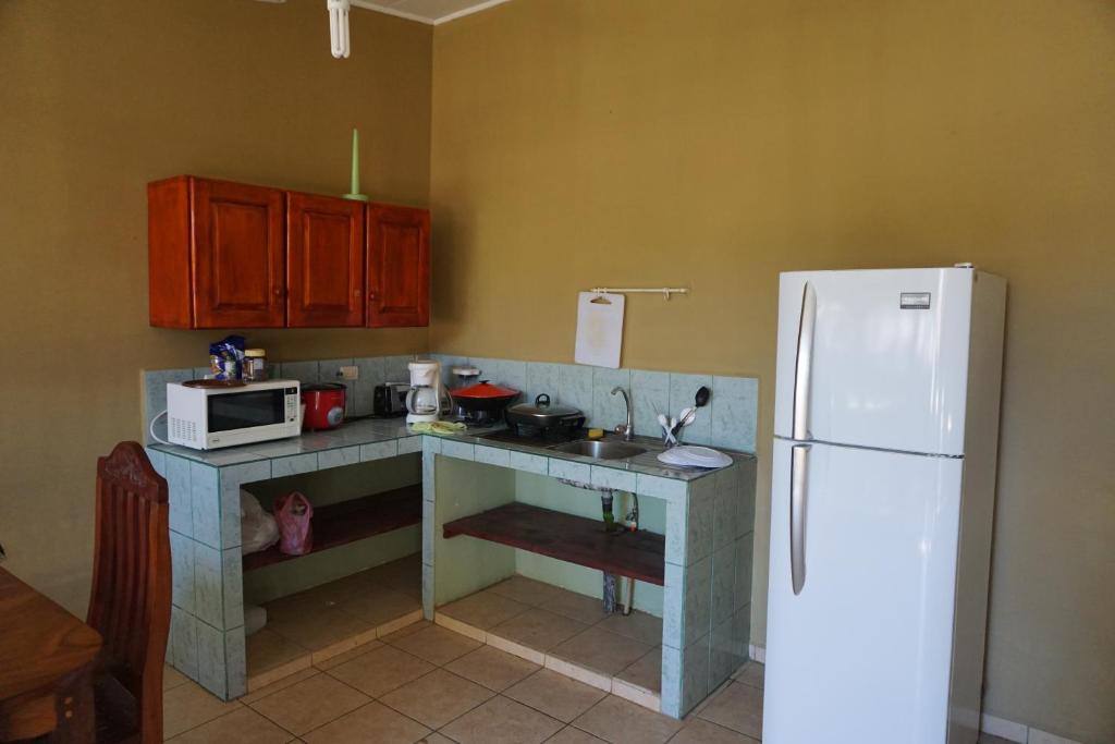 Kuchyň nebo kuchyňský kout v ubytování Villa Vilar