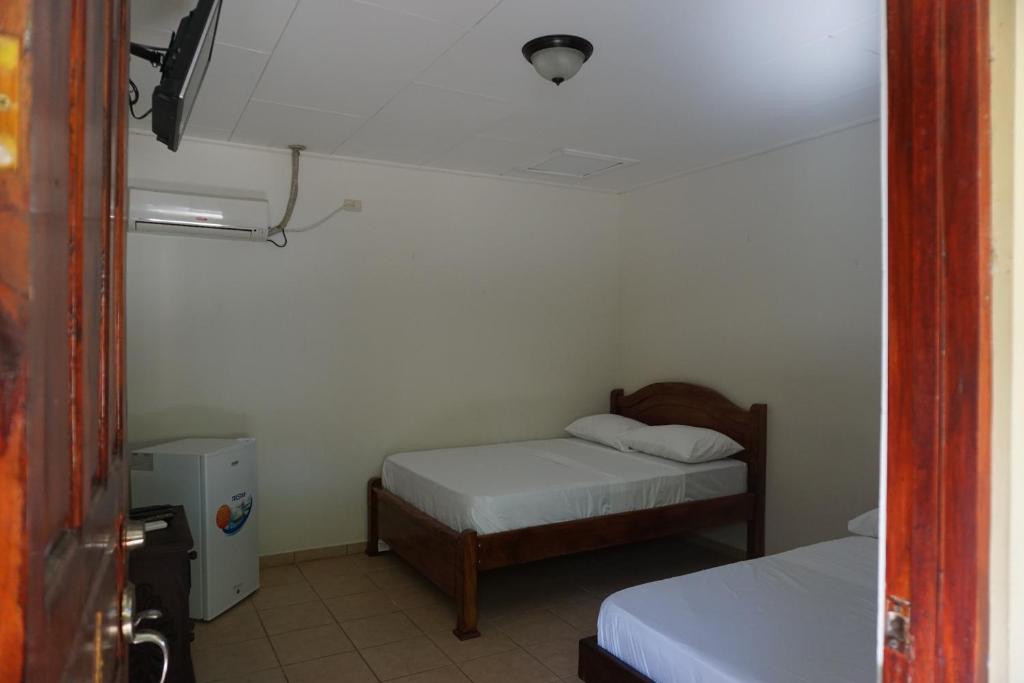 Postel nebo postele na pokoji v ubytování Villa Vilar