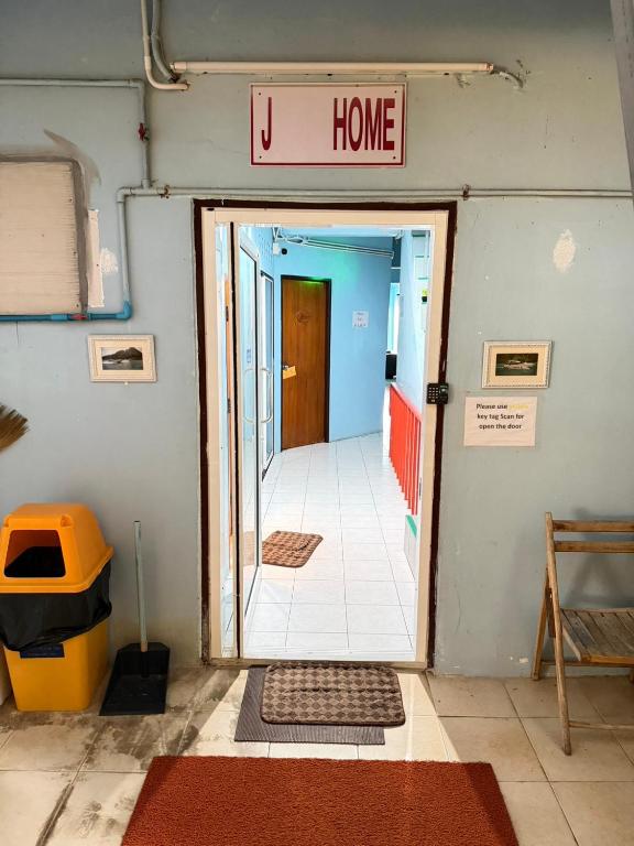 an open door to a hallway in a house at J Home Aonang in Ban Nong Chaeng