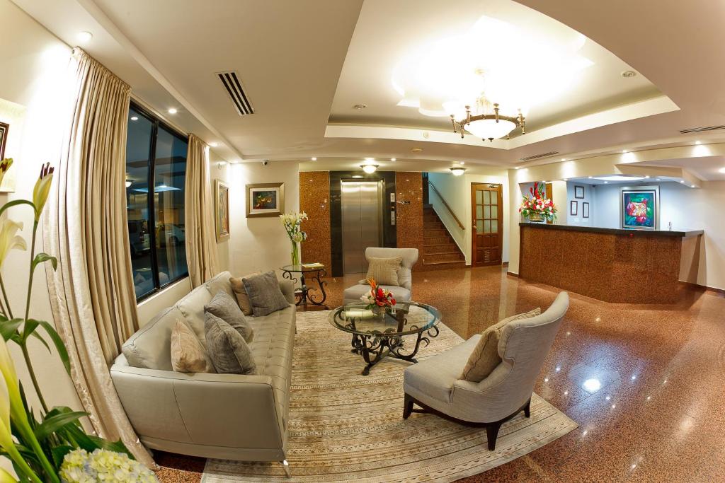 Un lugar para sentarse en Hotel Coral Suites