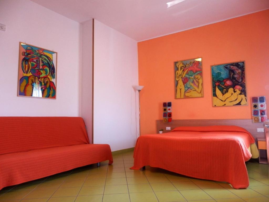 Postel nebo postele na pokoji v ubytování Alta Marea Sorrento