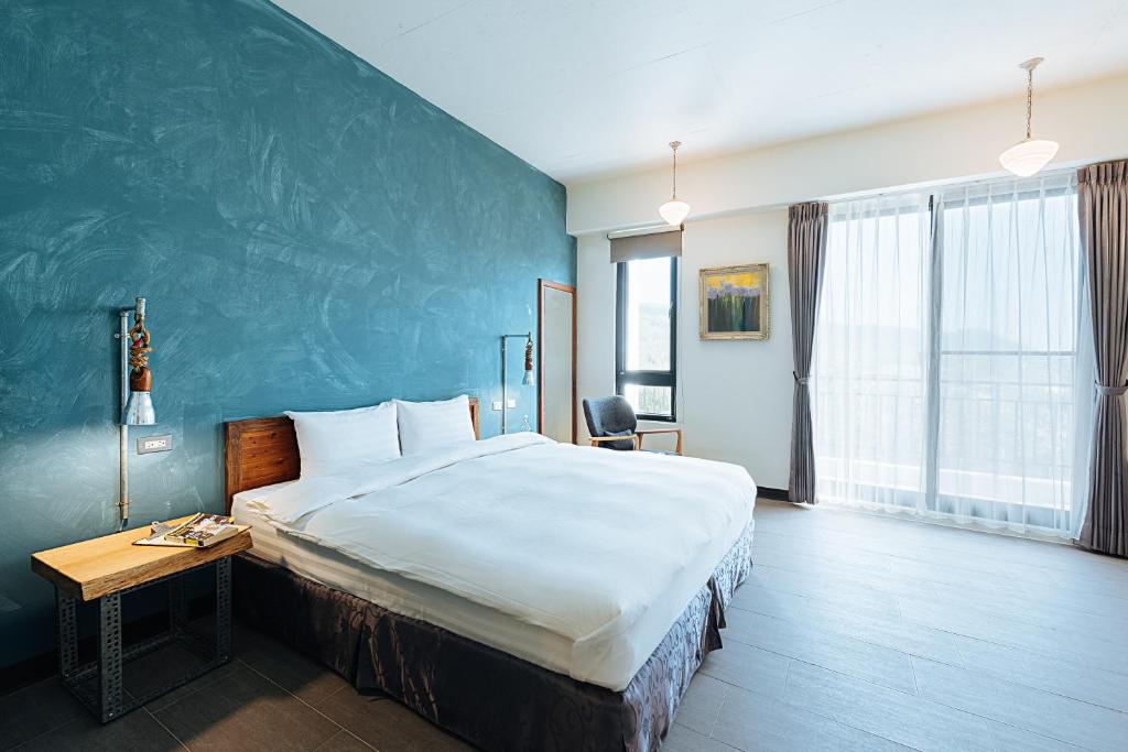 Postel nebo postele na pokoji v ubytování Chillax Inn B&B