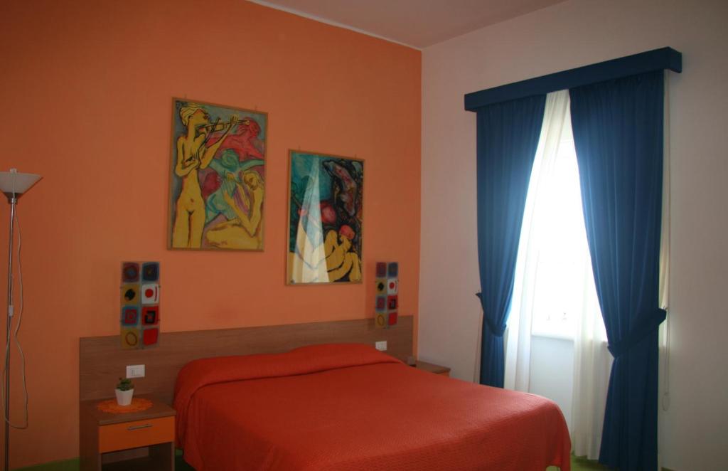 Postel nebo postele na pokoji v ubytování Alta Marea Sorrento