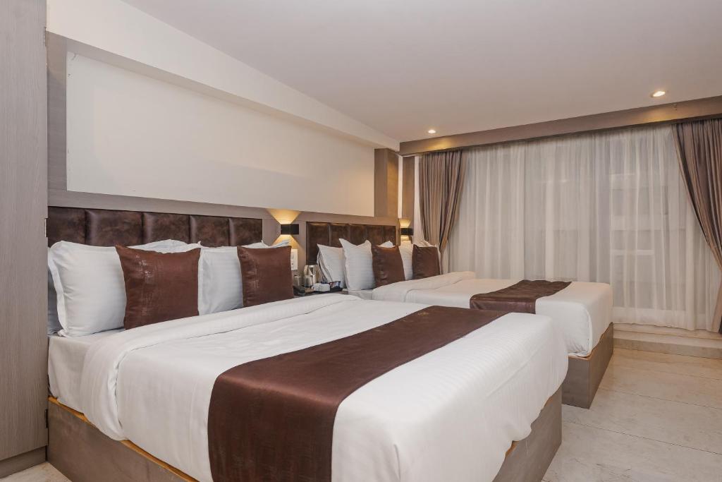 تصویر اتاق‌های Hotel Zillion International Near US Consulate B K C Mumbai Near Mumbai Airport Mumbai - تصویر ۲