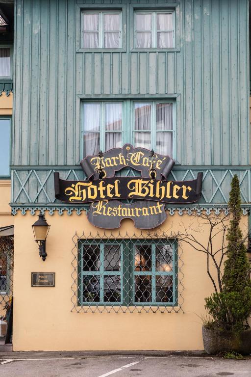 a sign on the side of a building at Hotel Bihler in Bad Aibling