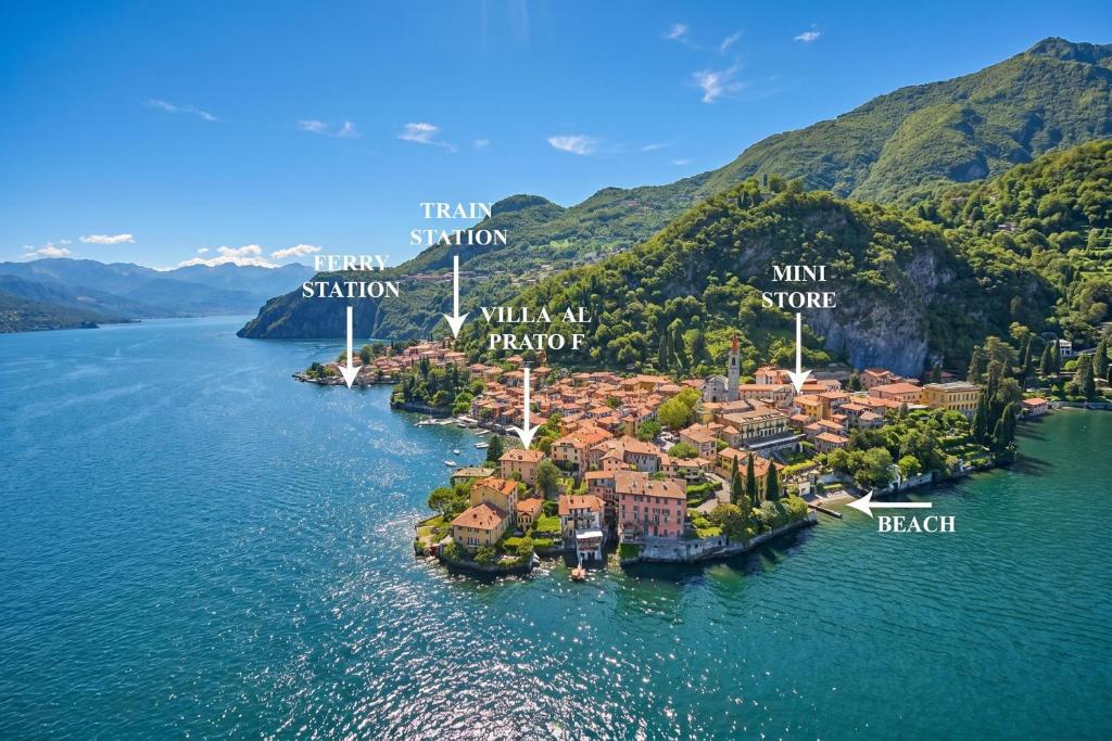 an island in the middle of a body of water at Casa Al Prato Apt. F in Varenna