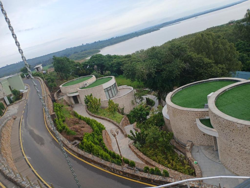 arial view of a building on a hill with a road at Gorgora Eco Resort in Gorgora