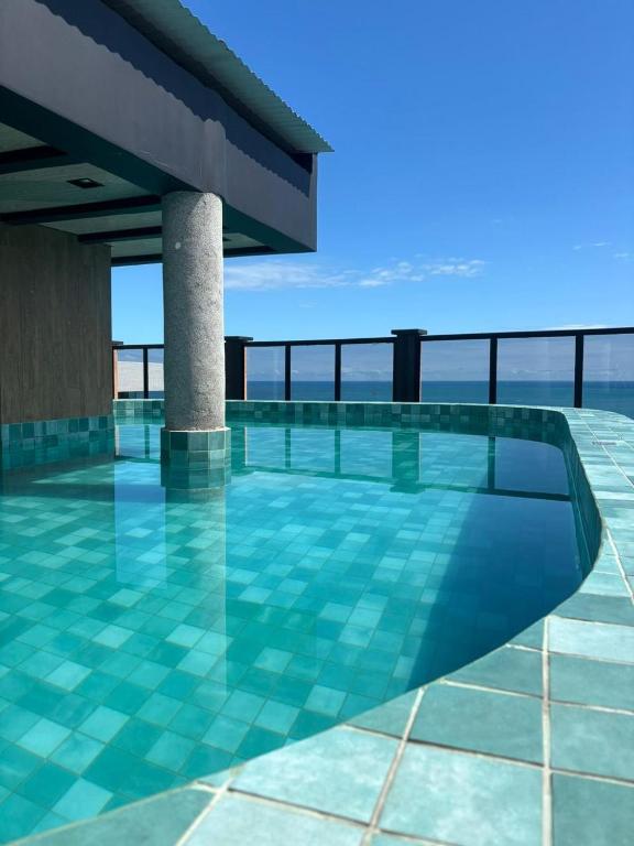 a swimming pool on the roof of a building at Hotel Brasil Tropical in Fortaleza