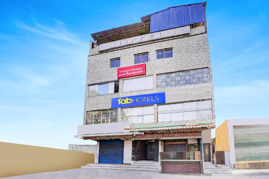 a building with a sign that reads job horizons at FabHotel Triotel Inn in Dhanbād
