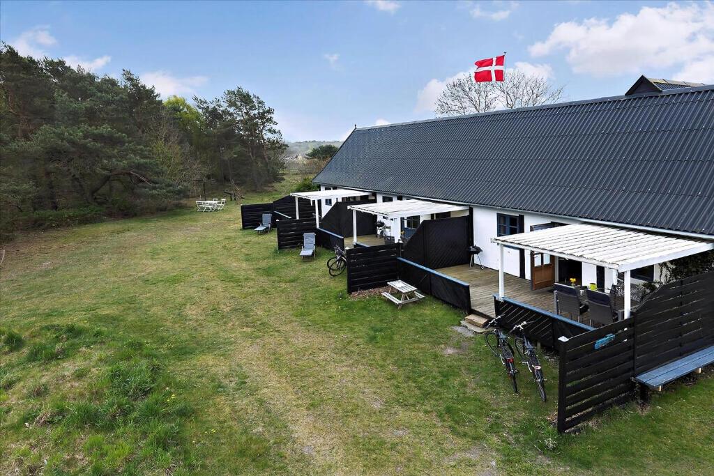 an aerial view of a building with a flag on it at Holiday Apartment In Peaceful Surroundings in Neksø