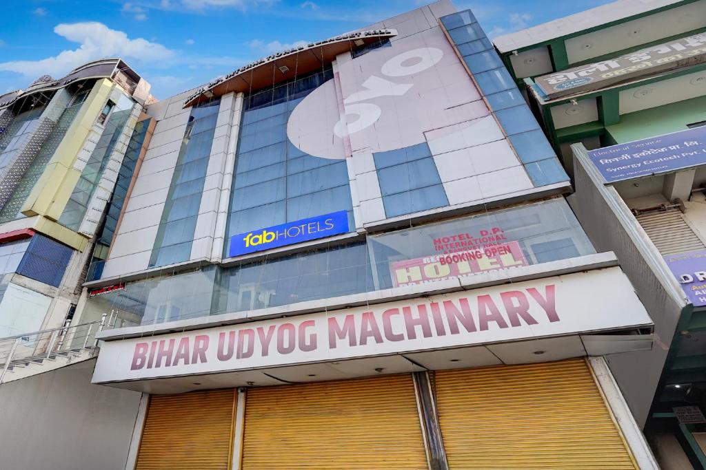 a building with a sign that reads china uppersq machinary at FabHotel DP International in Patna