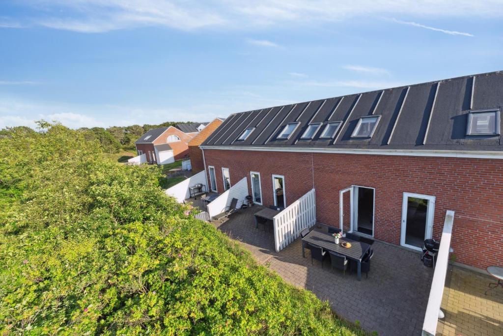 an aerial view of a house with solar panels at Summer House On Beautiful Rømø in Sønderby