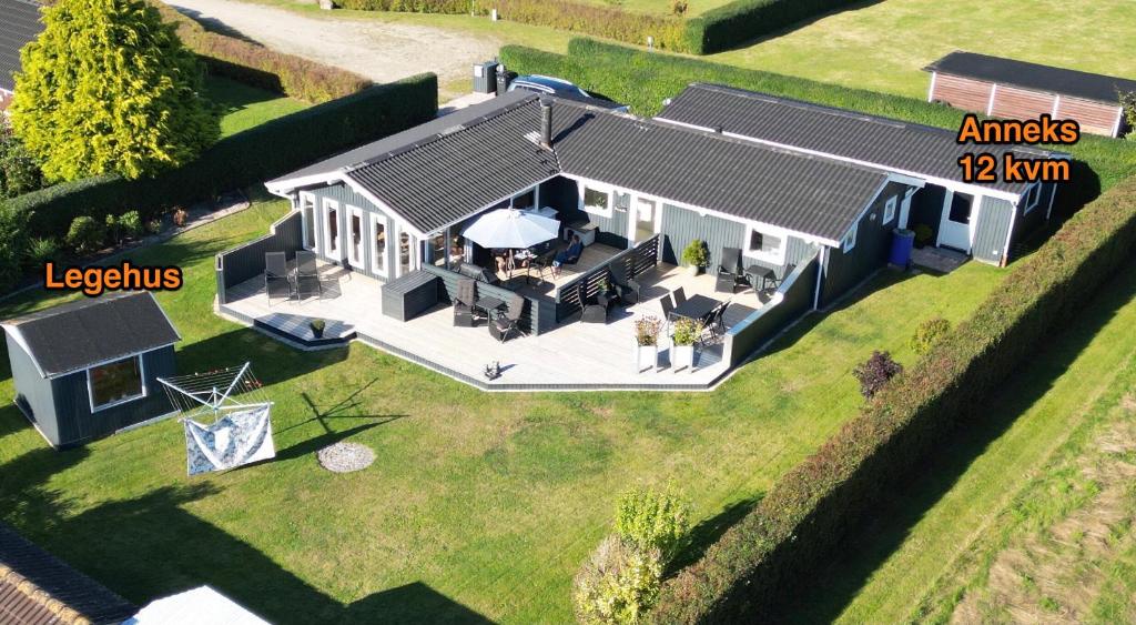 an overhead view of a house with a roof at Quiet Holiday Home With Annex And Great Outdoor in Bogø By