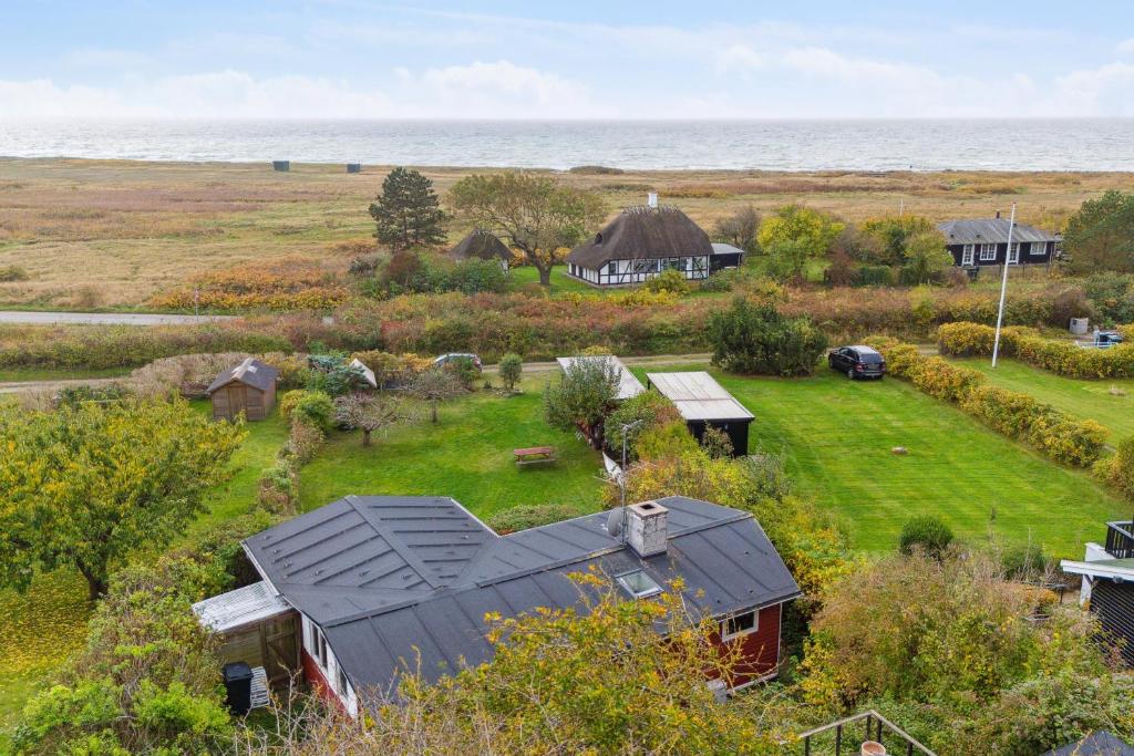 an aerial view of a yard with a house at Holiday Home And Annex Surrounded By Nature in Ebberup