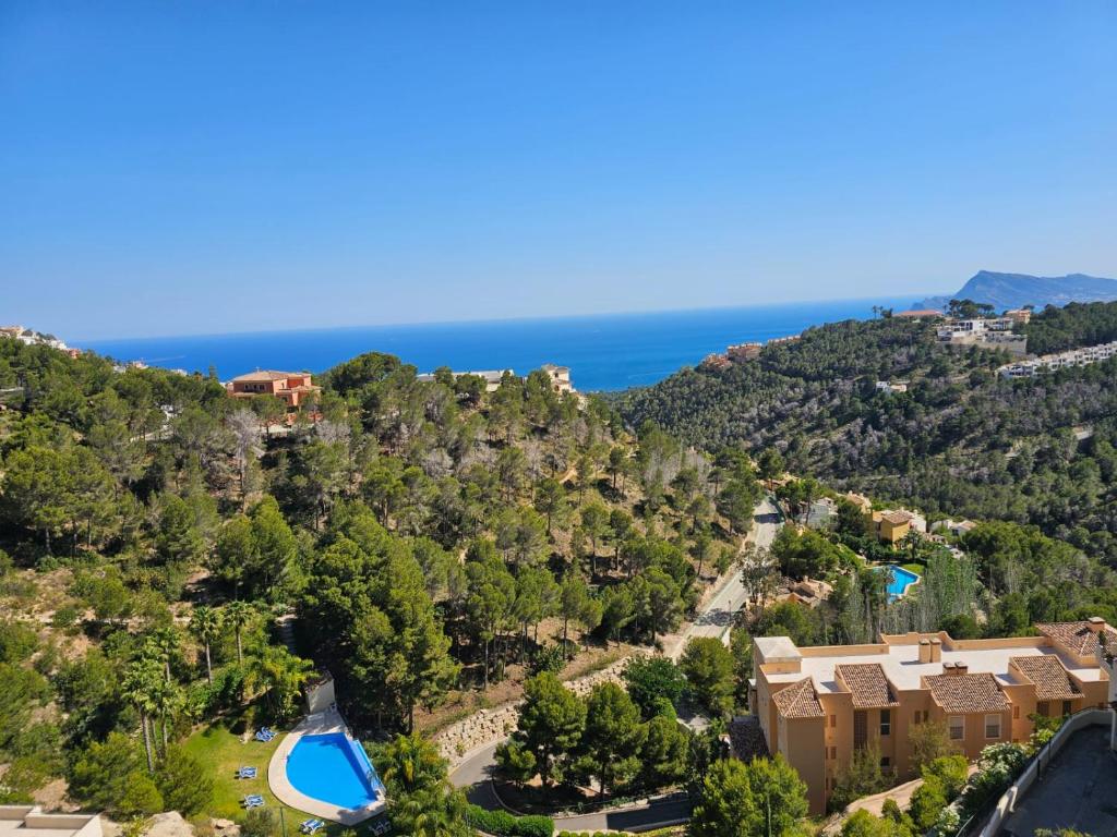 an aerial view of the resort and the ocean at Sea View Chalet - Altea Hills in Altea