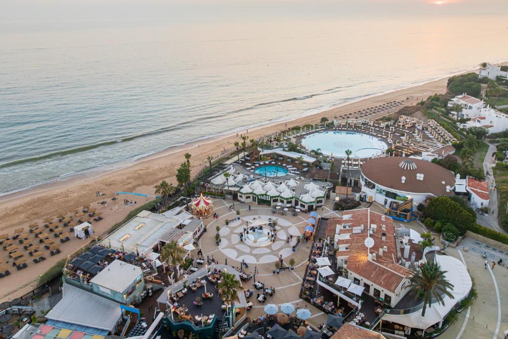 an aerial view of a resort next to the beach at Vale Do Lobo Resort in Vale do Lobo