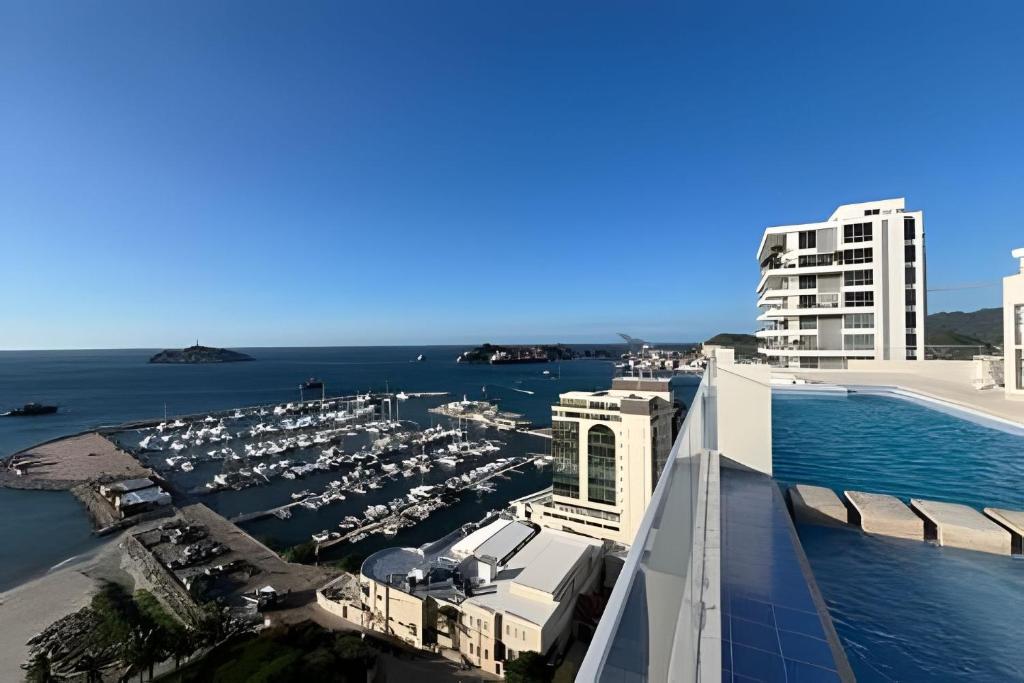 a view of a marina from the balcony of a hotel at Eira by Colproperty Management in Santa Marta